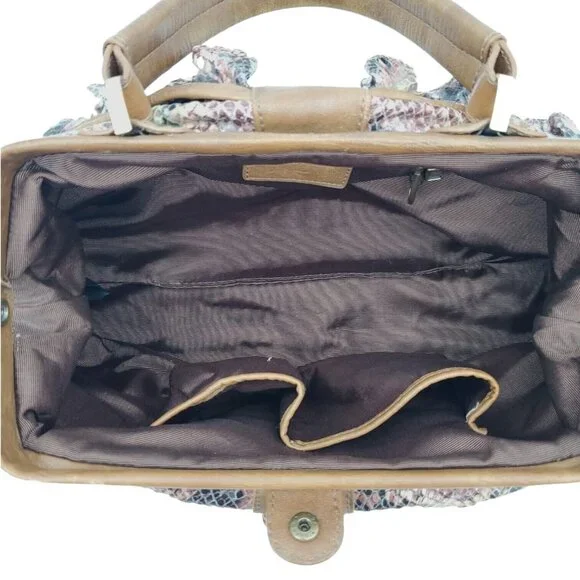 Rare Hard‎ toFind Vintage Jessica Simpson faux python purse. Great condition